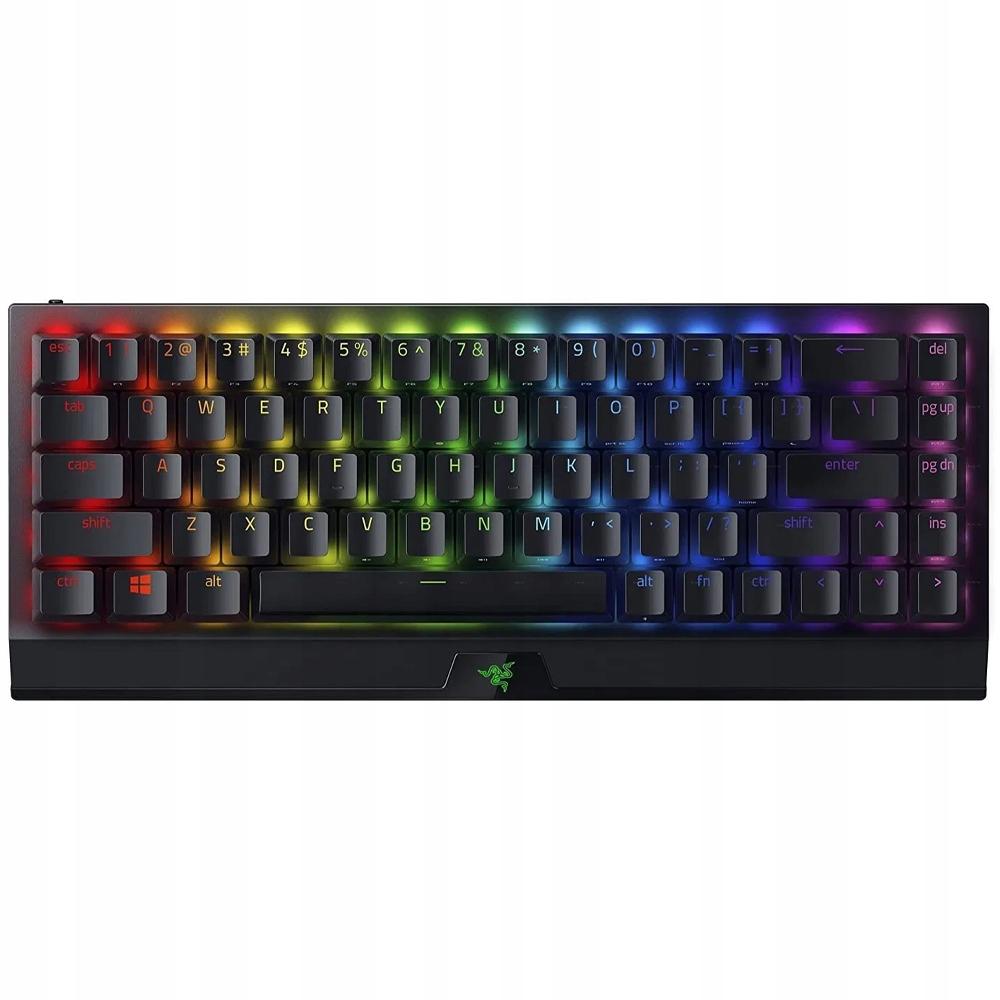Razer BlackWidow V4 Mini HyperSpeed - A Razer BlackWidow V3 Mini HyperSpeed billentyűzet egy letisztult gamer asztalon, bekapcsolt RGB világítással